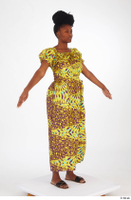  Dina Moses A poses dressed standing whole body yellow long decora apparel african dress 0008.jpg